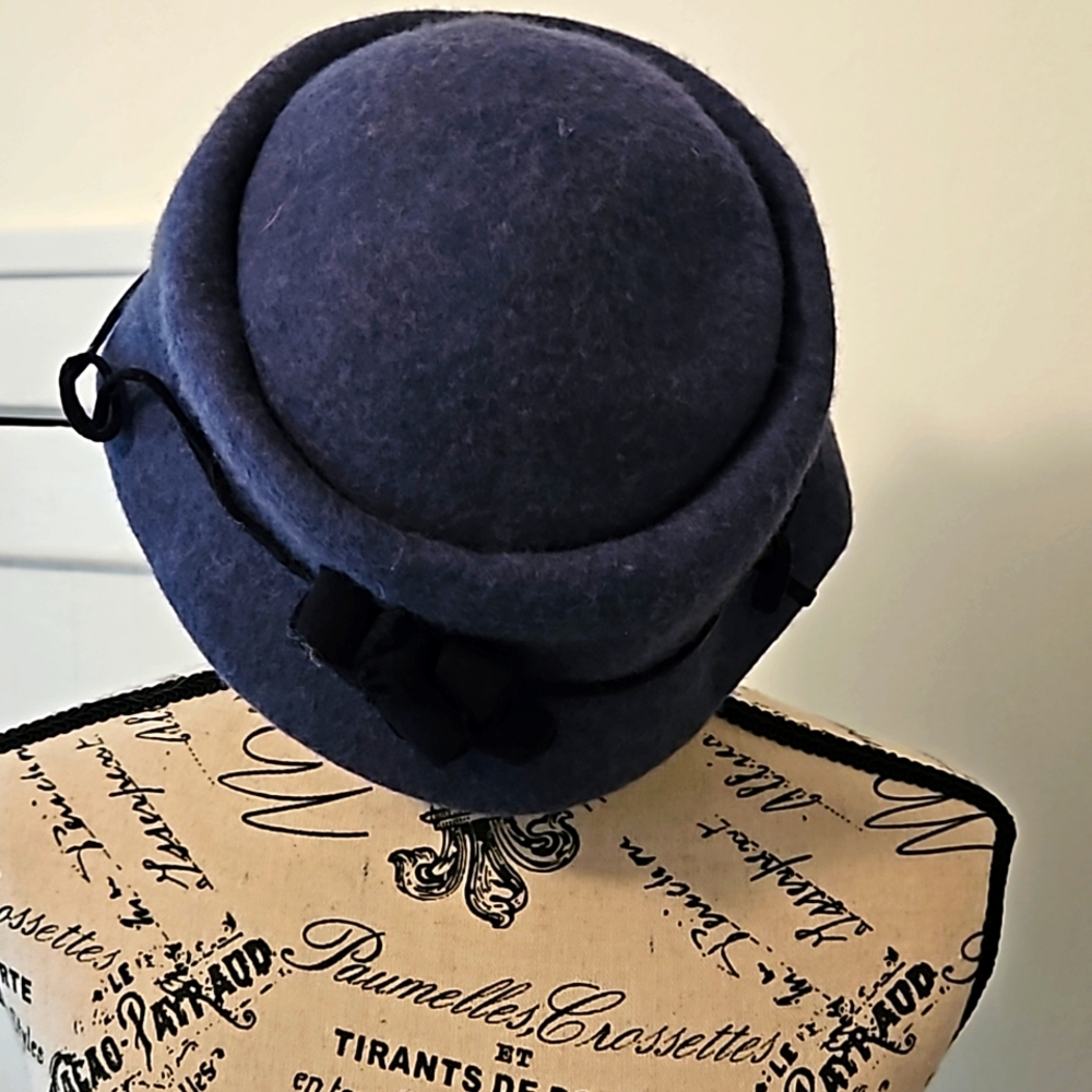 Blue wool hat with black trim